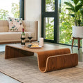 Wooden coffee table with cheese and wine on top