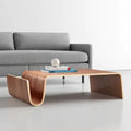 Wooden coffee table in front of sofa