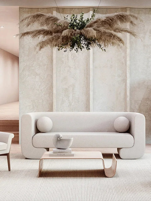 Wooden coffee table in front of sofa