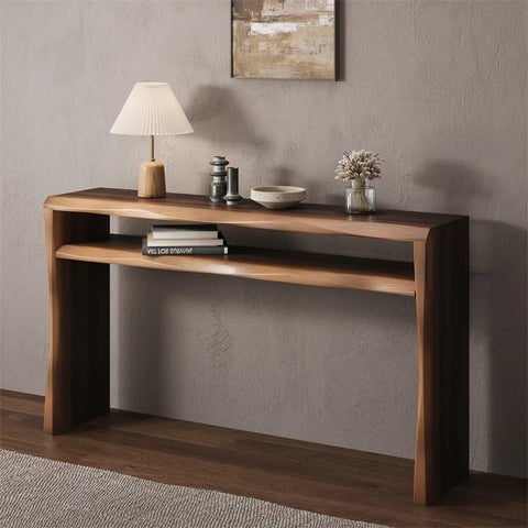 Console table against wall with lamp and ornaments