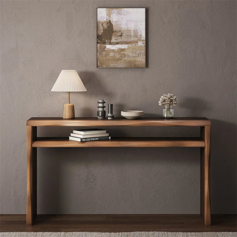 Console table against wall with lamp and ornaments