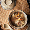 Ramen bowl with lid on table