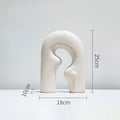 White statue with dimensions